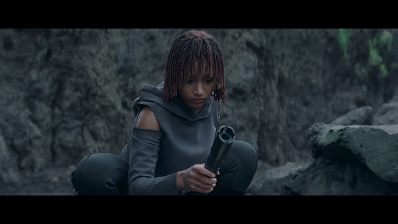 Osha considers slaying Qimir with his own lightsaber in The Acolyte Season 1 Episode 6 (2024)