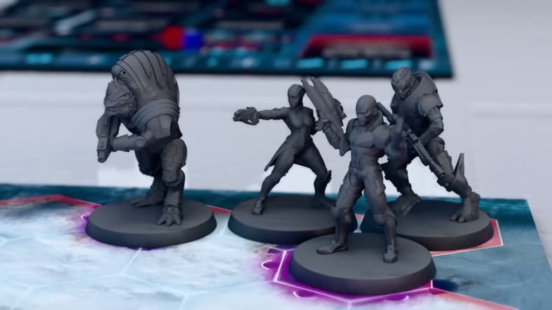 Wrex, Liara, Shepard, and Garrus march forward in Mass Effect: The Board Game - Priority Hagalaz