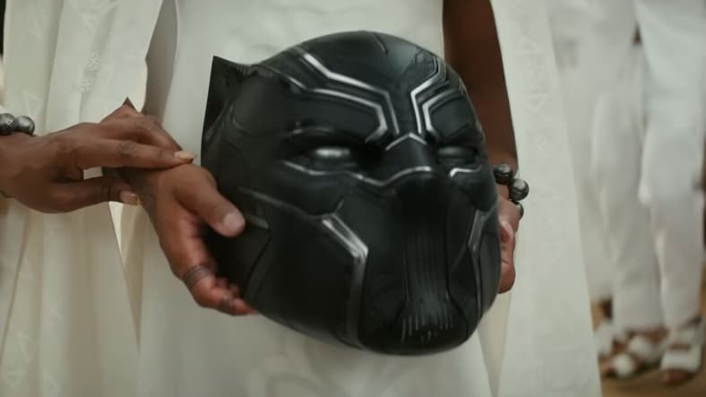 Shuri carries the fallen Black Panther's helmet in Black Panther: Wakanda Forever (2022), Marvel