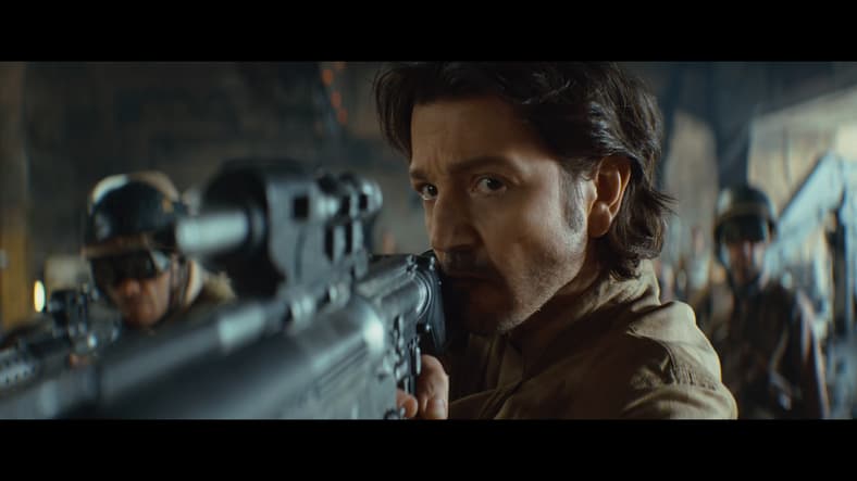 Cassian Andor (Diego Luna) demands that K2 (Alan Tudyk) be returned to him in Andor Season 2 Episode 9 "Welcome to the Rebellion" (2025), Lucasfilm