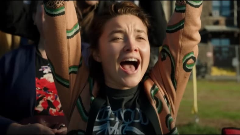 Allison (Florence Pugh) cheering at the match in A Good Person, 2023, MGM