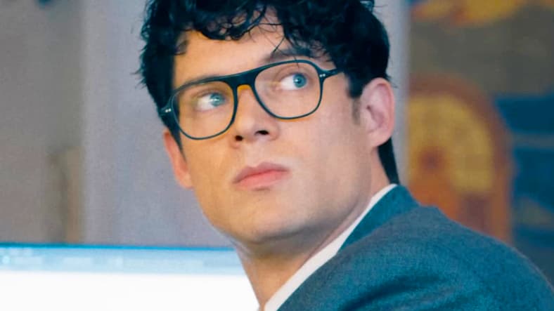 Clark Kent (David Corenswet) snaps to attention at the call of Perry White (Wendell Pierce) in Superman (2025), DC Studios