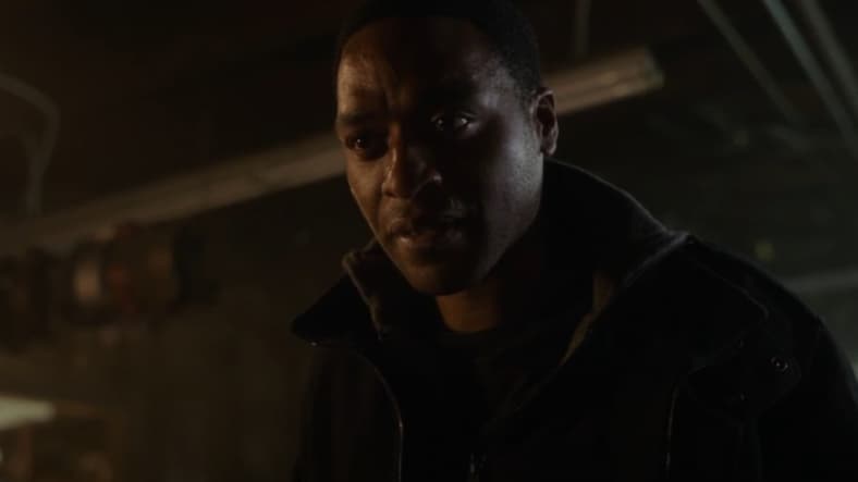 Baron Mordo (Chiwetel Ejiofor) taking away Jonathan Pangborn's (Benjamin Bratt) magical powers in Doctor Strange (2016), Marvel Entertainment