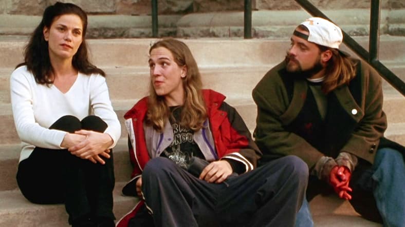 Bethany (Linda Fiorentino), Jay (Jason Mewes), and Silent Bob (Kevin Smith) take a breather after saving all of creation in Dogma (1999), View Askew Productions