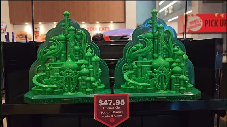 The Emerald City popcorn bucket for Wicked: For Good on display at Cinemark