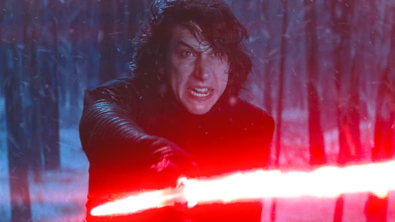 Kylo Ren (Adam Driver) draws his light saber in Star Wars Episode VII - The Force Awakens (2015), Lucasfilm