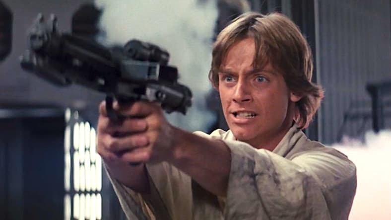 Luke Skywalker (Mark Hamill) blasts some Stormtroopers in 'Star Wars: Episode IV - A New Hope' (1977), Lucasfilm