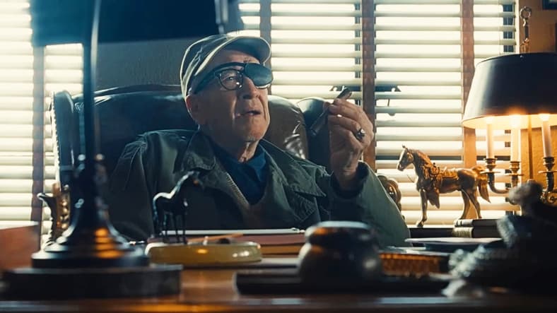 John Ford (David Lynch) enjoys a fine cigar in The Fabelmans (2022), Universal Pictures