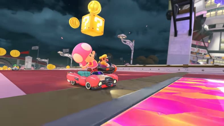 Toadette (Samantha Kelly) hammers a Question Mark Block for coins in Mario Kart World (2025), Nintendo
