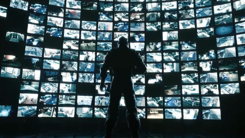 Mute (Gary Milner) looks out on CCTV feeds he's about to cut off in Tom Clancy's Rainbow Six Siege (2015) Ubisoft