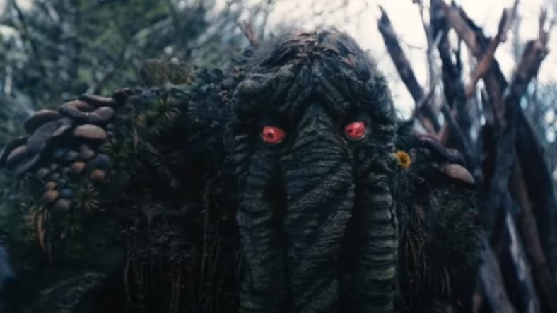 Man Thing (Conan Stevens) speaking to Jack Russell (Gael Garcia Bernal) in Werewolf by Night 2022, Marvel Entertainment