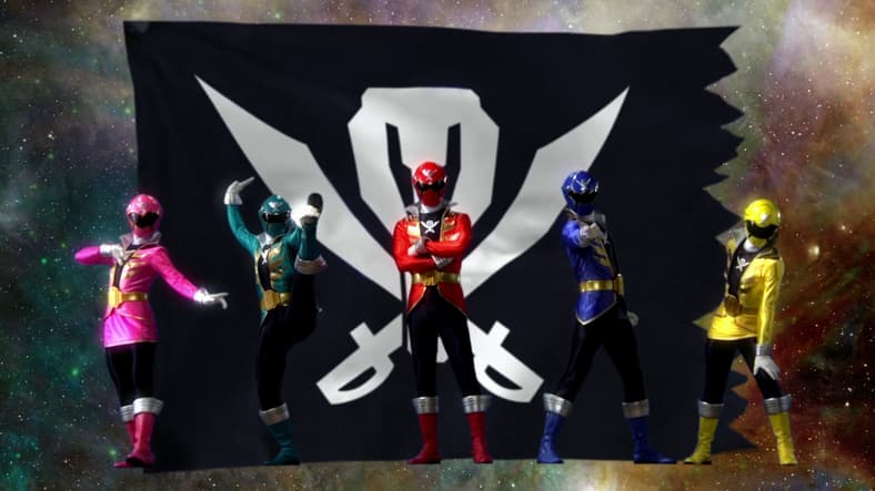 The titular team strike a pose as they prepare to finish off Los Dark (Kenji Utsumi) in Kaizoku Sentai Gokaiger the Movie: The Flying Ghost Ship (2011), Toei Co. Ltd.