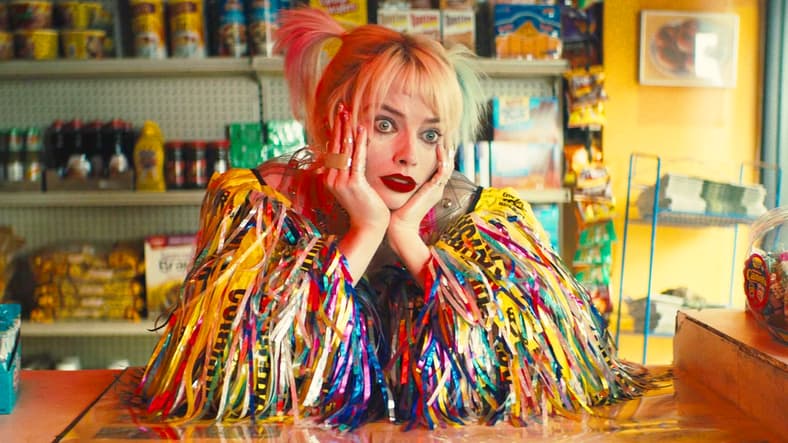 Harley Quinn (Margot Robbie) flashes heart eyes at her breakfast in Birds of Prey (2020), Warner Bros. Entertainment