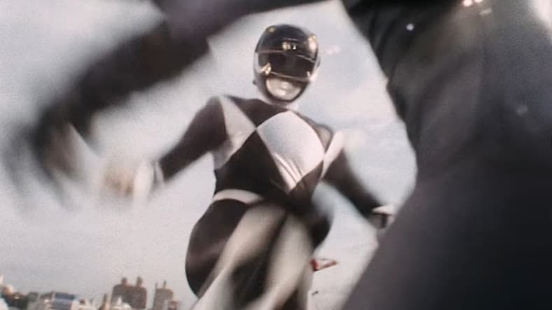 The Black Ranger (Walter Emanuel Jones) delivers a decisive kick to an enemy putty in Mighty Morphin' Power Rangers Season 1 Episode 1 "Day of the Dumpster" (1993), Saban