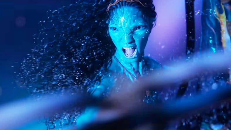 Ronal (Kate Winslet) fights back against the attacking Mangkwan tribe members in Avatar: Fire and Ash (2025), 20th Century Studios