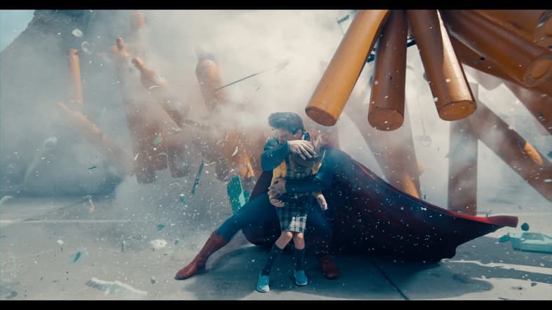 Superman (David Corenswet) saves a young girl from certain death in Superman (2025), DC Studios