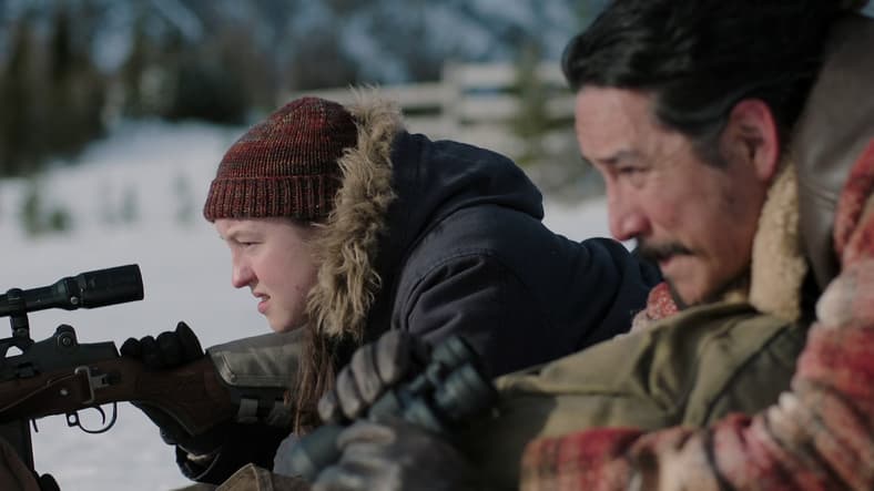 Ellie (Bella Ramsey) gets in some target practice with Tommy (Gabriel Luna) in The Last of Us Season 2 Episode 1 "Future Days" (2025), HBO