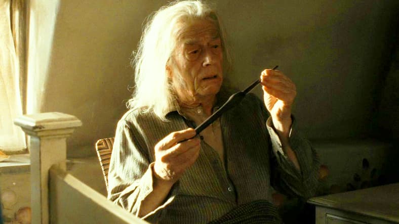 Harry Potter (Daniel Radcliffe) asks Garrick Ollivander (John Hurt) about Bellatrix Lestrange's (Helena Bonham Carter) and Draco Malfoy's (Tom Felton) wands in Harry Potter and the Deathly Hallows: Part 2 (2011), Warner Bros. Pictures