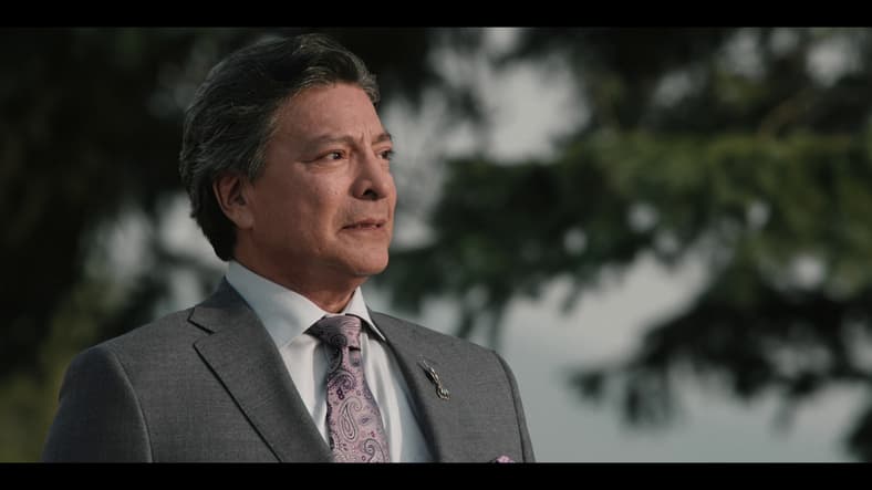 Thomas Rainwater (Gil Birmingham) is left speechless as his tribe is gifted back the land of the Dutton ranch in Yellowstone Season 5 Episode 14 "Life is a Promise" (2024), Paramount Network