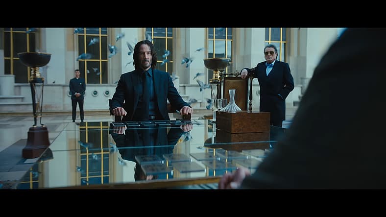 John Wick (Keanu Reeves) meets Marquis Vincent de Gramont (Bill Skarsgård) in John Wick: Chapter 4