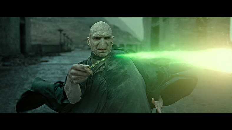 Lord Voldemort (Ralph Fiennes) strikes at Harry Potter in Harry Potter and the Deathly Hallows