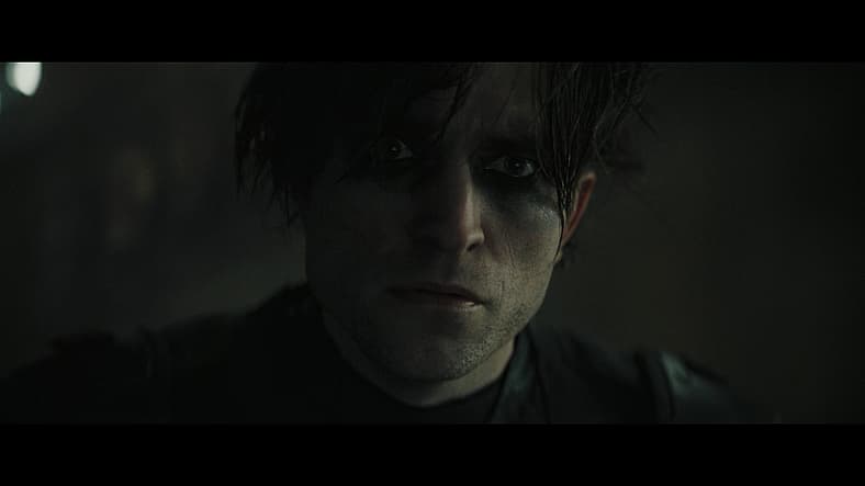 Bruce Wayne sees The Riddler's new video in The Batman (2022), Warner Bros. Pictures