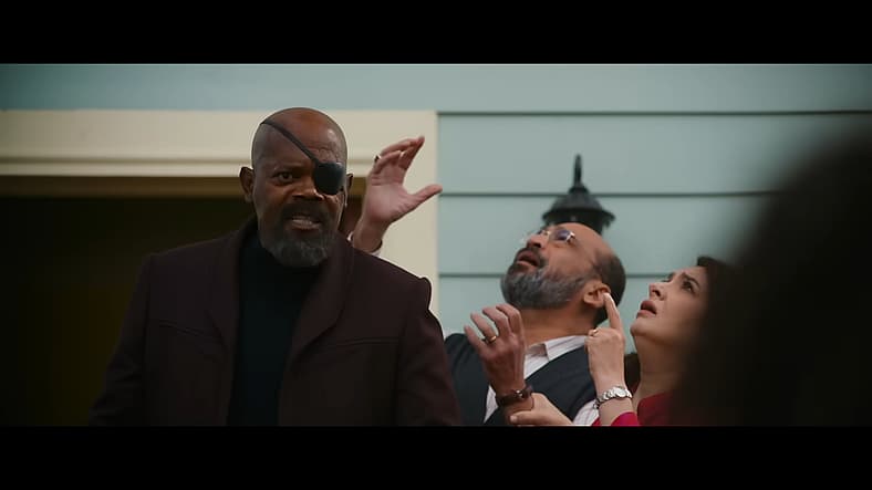 Nick Fury (Samuel L. Jackson) encourages Monica Rambeau (Teyonnah Parris) to save Kamala Khan in