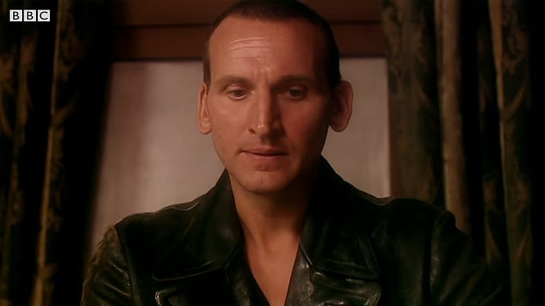 The Doctor (Christopher Eccleston) watches a missile destroy the Slitheen in Doctor Who Series 1