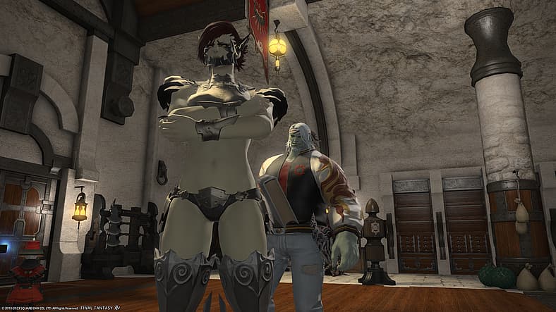 Roegadyn Monk smiles at Squadron member Raelthota in Final Fantasy XIV: Endwalker (2021), Square
