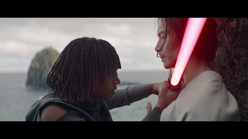 Osha brings Qimir's lightsaber to his throat in The Acolyte Season 1 Episode 6 (2024), Disney