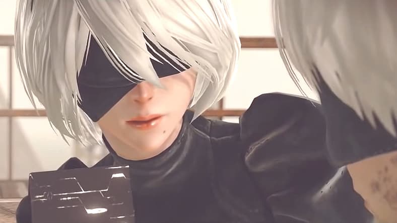 2B and 9S prepare to sacrifice themselves and overload a Black Box in Nier: Automata (2017)