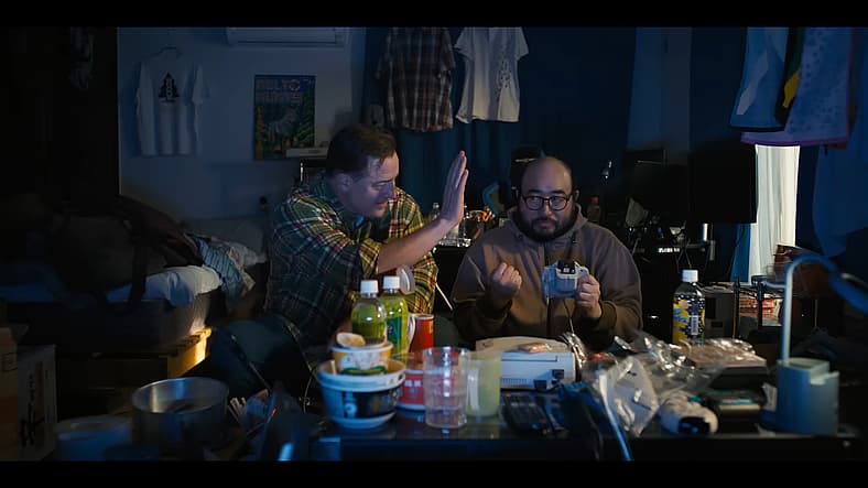 Phillip Vandarploeug (Brendan Fraser) celebrates a victory in Rental Family (2025), Searchlight