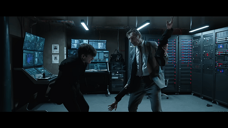 Frank Drebin Jr. (Liam Neeson) disarms a poor soul in The Naked Gun (2025), Paramount Pictures