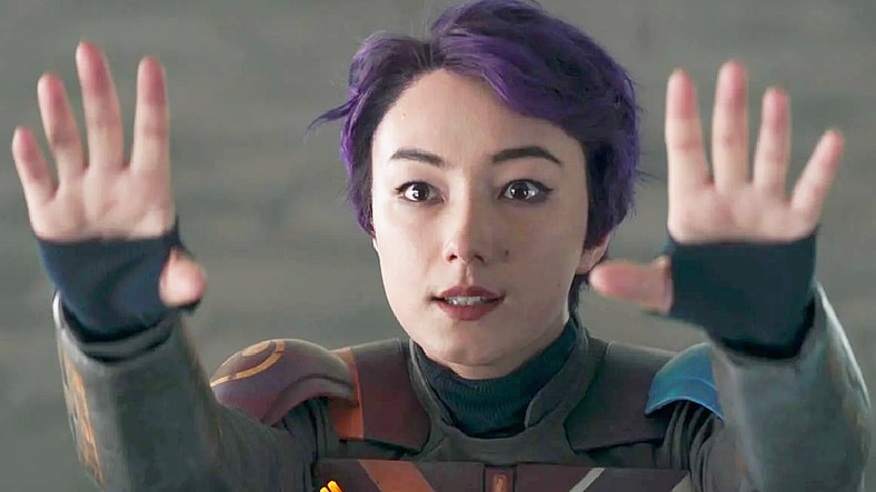 Sabine (Natasha Liu Bordizzo) gives Ezra (Eman Esfandi) a Force-assisted boost in Ahsoka Season 1 Episode 8 "Part Eight: The Jedi, the Witch, and the Warlord" (2023), Disney