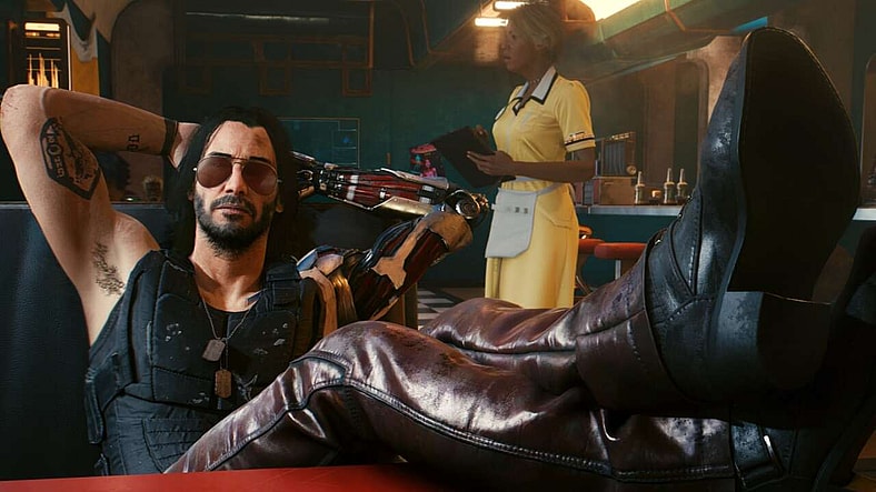 Johnny Silverhand (Keanu Reeves) lounges at the diner in Cyberpunk 2077 (2020), CD Projekt Red