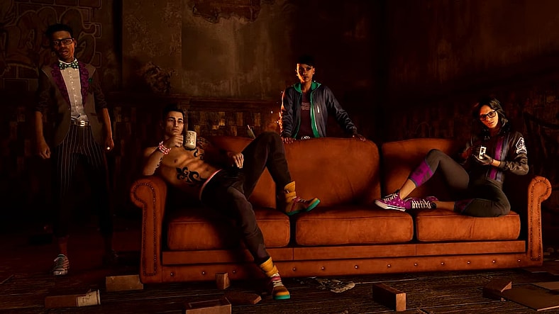 Kevin (Greg Chun), Eli (Eugene Byrd), the Boss, and Neenah (Jeannie Tirado) chilling on the couch in Saints Row (2022), Deep Silver Volition