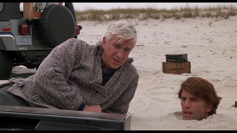 Leslie Nielsen shows Ted Danson what's on TV in Creepshow (1982), Warner Bros. Pictures
