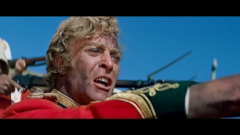 Lt. Gonville Bromhead (Michael Caine) orders his troops to fire in Zulu (1964), Diamond Films