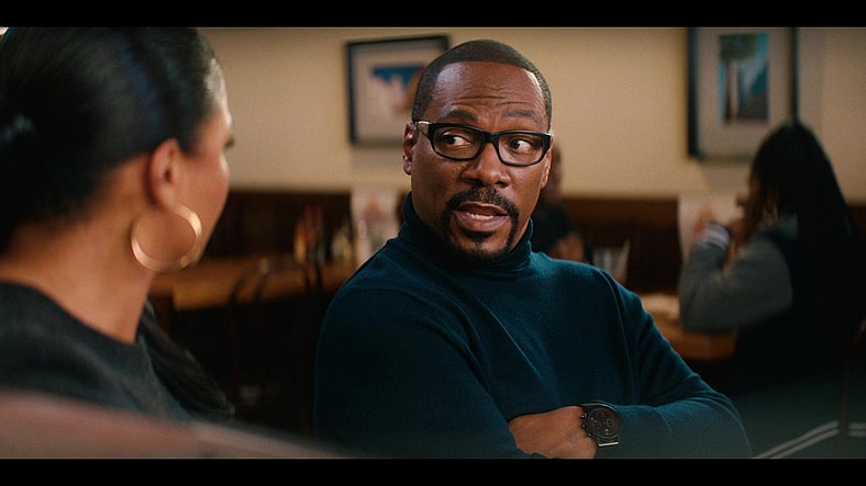Akbar (Eddie Murphy) is not happy with Amira's (Lauren London) romantic choices in You People (2023), Netflix