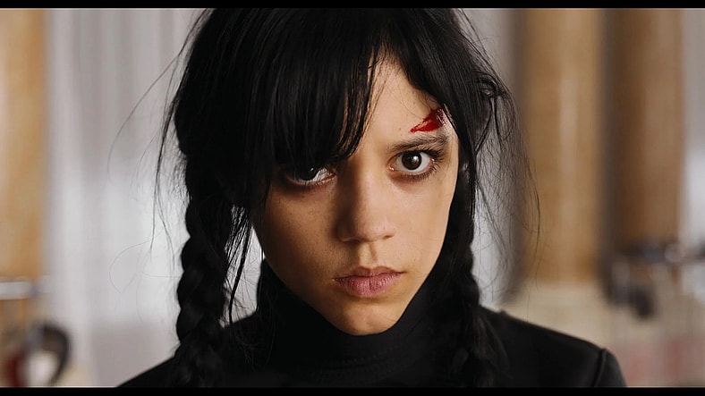Wednesday (Jenna Ortega) does not take kindly to losing a fencing match in Wednesday Season 1 Episode 1 "Wednesday's Child Is Full Of Woe" (2022), Netflix