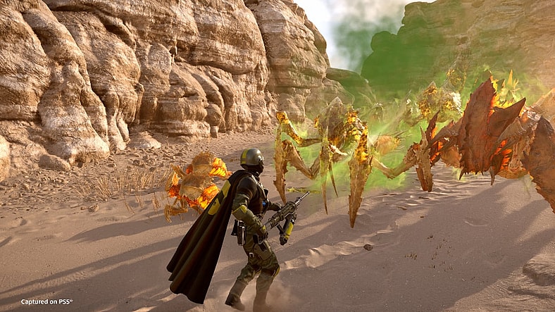 A Helldiver douses an oncoming tyranid swarm with toxic gas in Helldivers 2 (2024), Arrowhead Game Studios