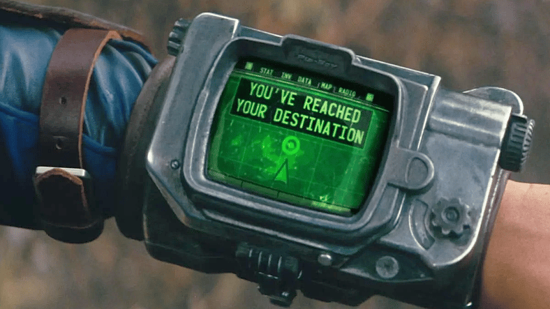 Lucy (Ella Purcel) gets a message from her Pip-Boy in Fallout Season 1 Episode 8 "The Beginning", Amazon Prime Studios