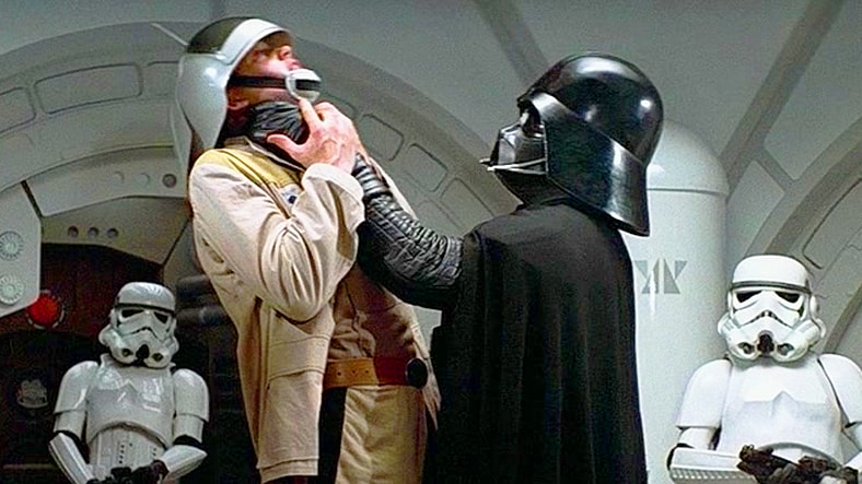 Darth Vader (David Prowse/James Earl Jones) interrogates Captain Antilles (Peter Geddis) for details regarding the location of Leia Organa (Carrie Fisher) in Star Wars: Episode IV - A New Hope (1977), Lucasfilm