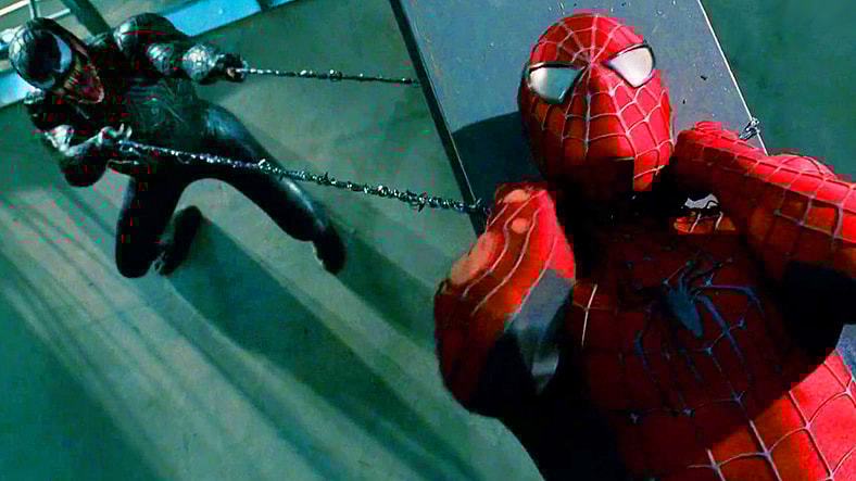 Venom (Topher Grace) uses his tendrils to choke out Peter Parker (Tobey Maguire) in Spider-Man 3 (2007), Sony Pictures