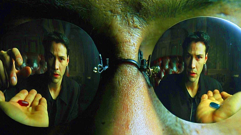 Morpheus (Laurence Fishburne) offers Neo (Keanu Reeves) a choice between the blue and red pill in The Matrix (1999), Warner Bros. Pictures