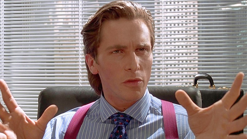 Patrick Bateman (Christian Bale) speaks with Donald Kimball (Willem Dafoe) regarding Paul's (Jared Leto) disappearance in American Psycho (2000), Lionsgate Films