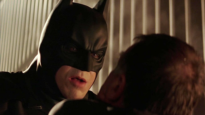 Bruce Wayne (Christian Bale) makes his costumed debut in Batman Begins (2005), Warner Bros. Pictures