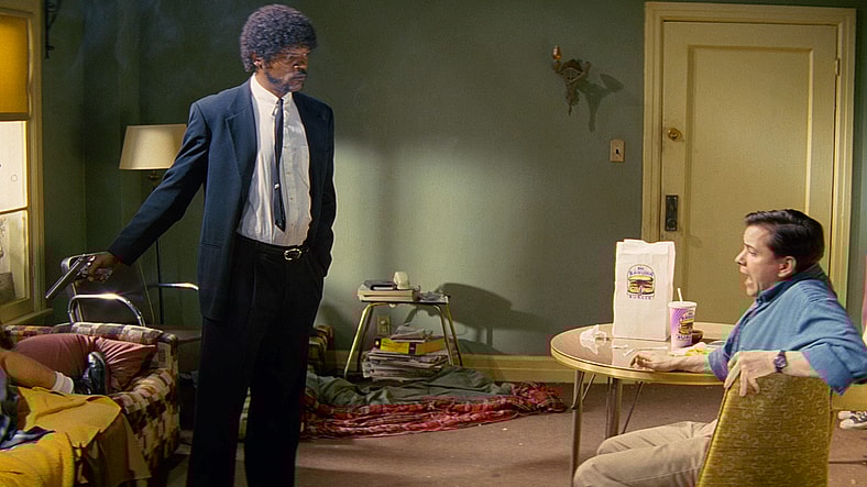 Jules Winnfield (Samuel L. Jackson) shows Brett (Frank Whaley) that he's serious about retrieving Masellus Wallace's (Ving Rhames) briefcase in Pulp Fiction (1994), Miramax