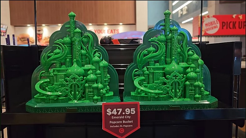 The Emerald City popcorn bucket for Wicked: For Good on display at Cinemark