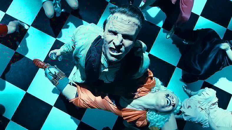 Frank (Christian Bale) and The Bride (Jessie Buckley) share a dance in The Bride! (2026), Warner Bros. Pictures